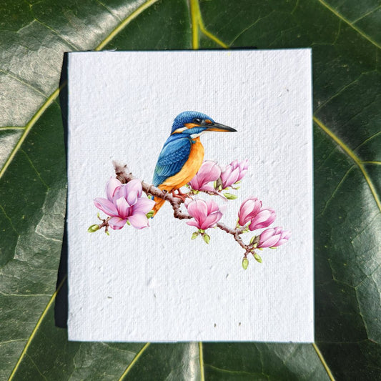 Blue and yellow bird on pink flowers on card