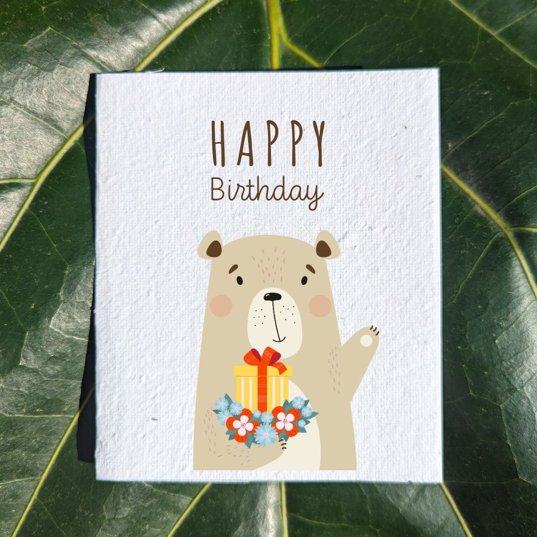 Birthday card with a waving bear